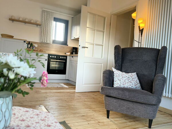 Wohnzimmer der Ferienwohnung Eifelcottage auf dem Landgut Pfauenhof in der Eifel